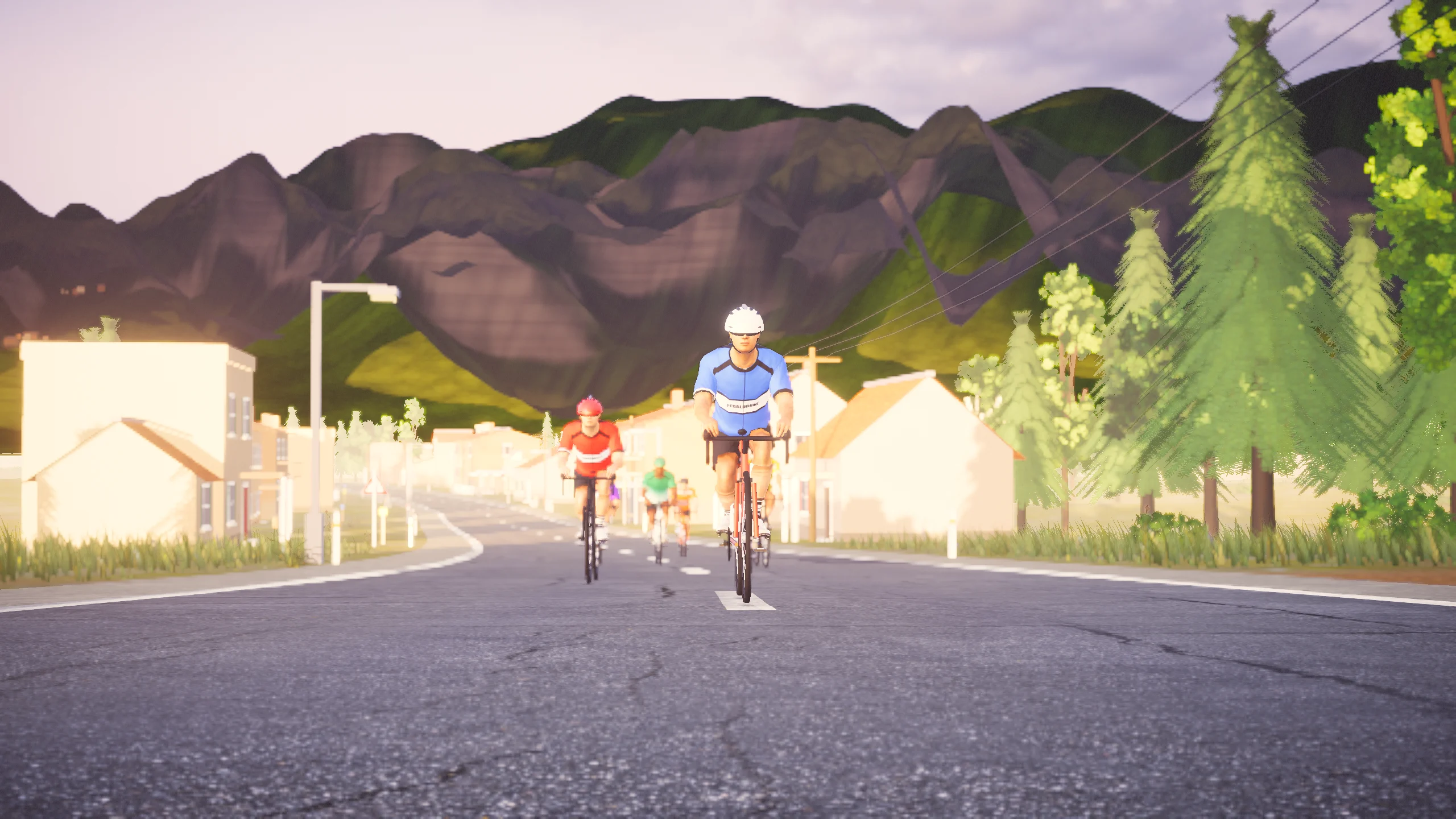 The peloton rides towards the camera